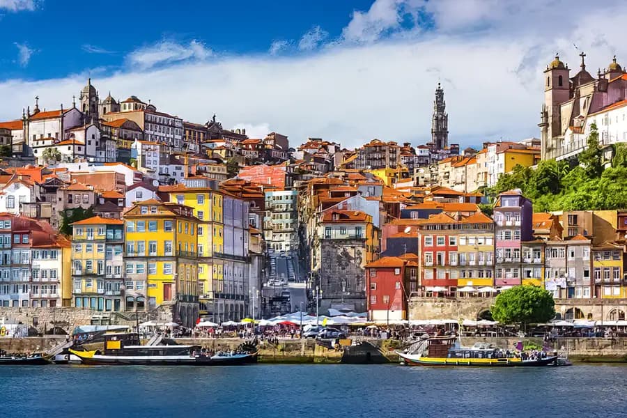 Porto Ribeira, Portugal, with colourful houses and boats on the Douro River