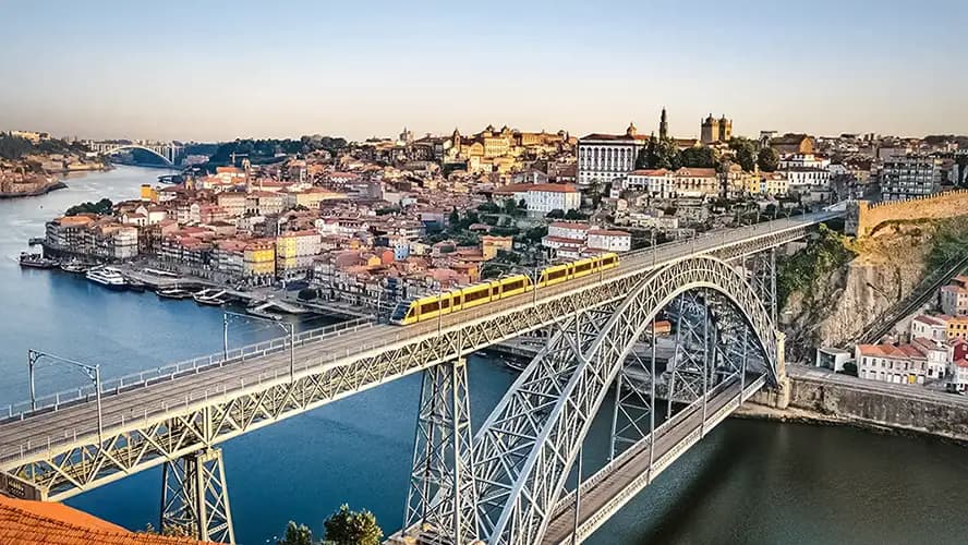 Dom Luís I Bridge in Porto, Portugal, with the metro crossing the Douro River
