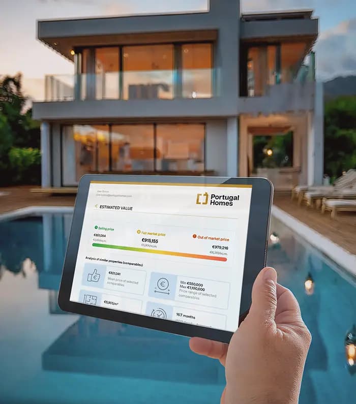 A hand holding a tablet with valuation data in fornt of a modern villa with pool